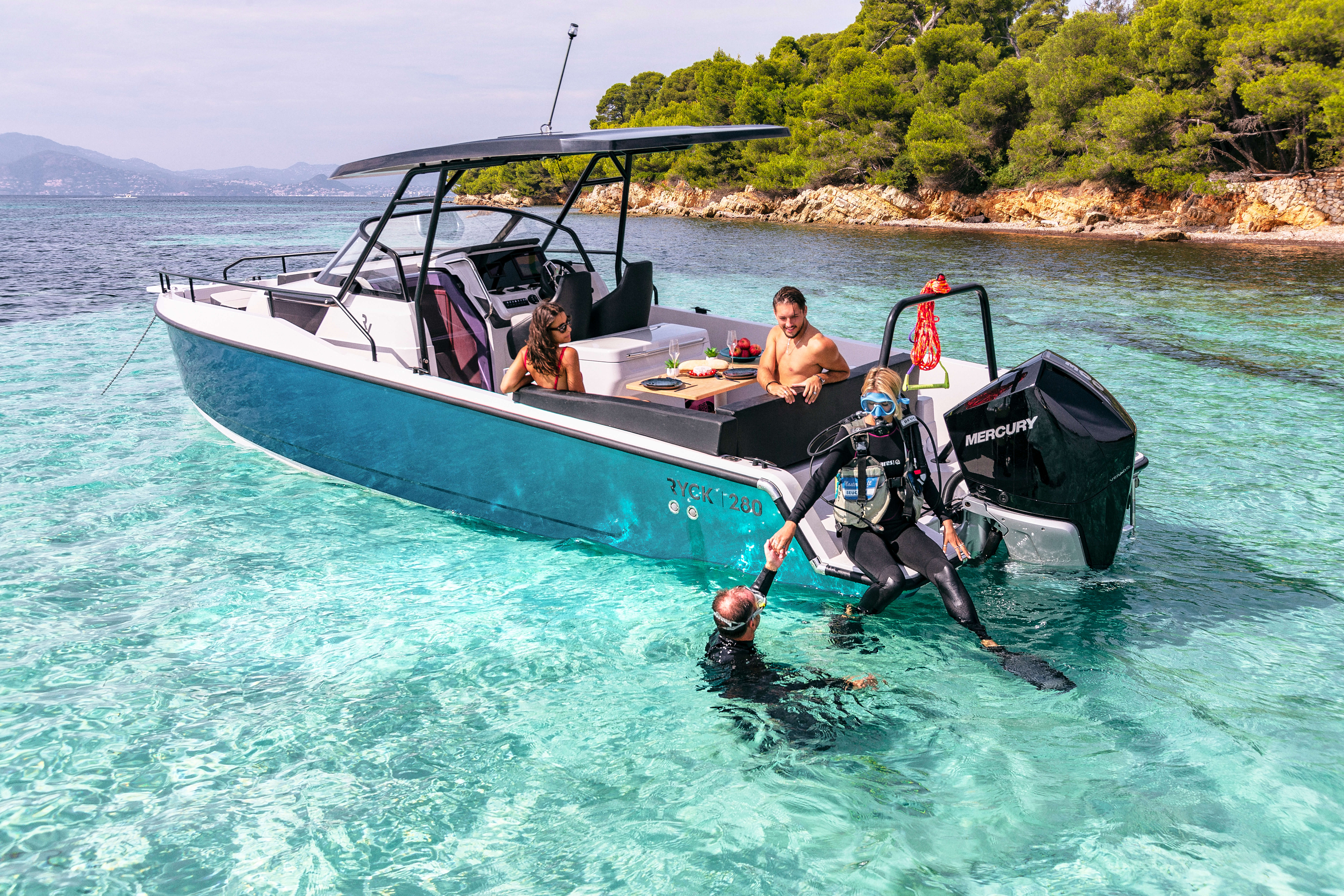 Anchored motorboat RYCK 280 with a team of divers.